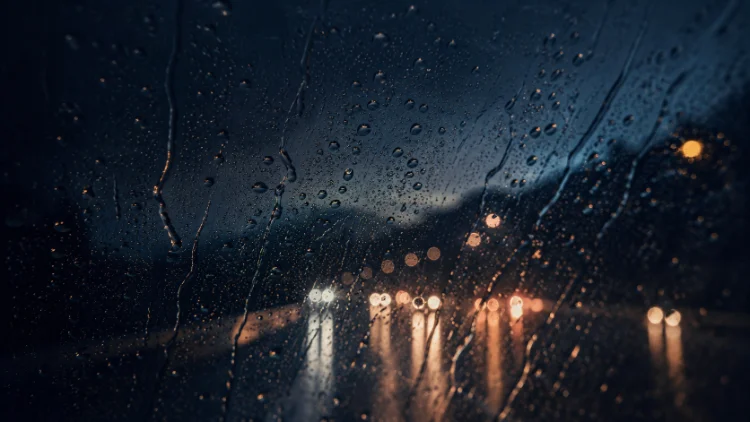 Rain on glass · amber backlight