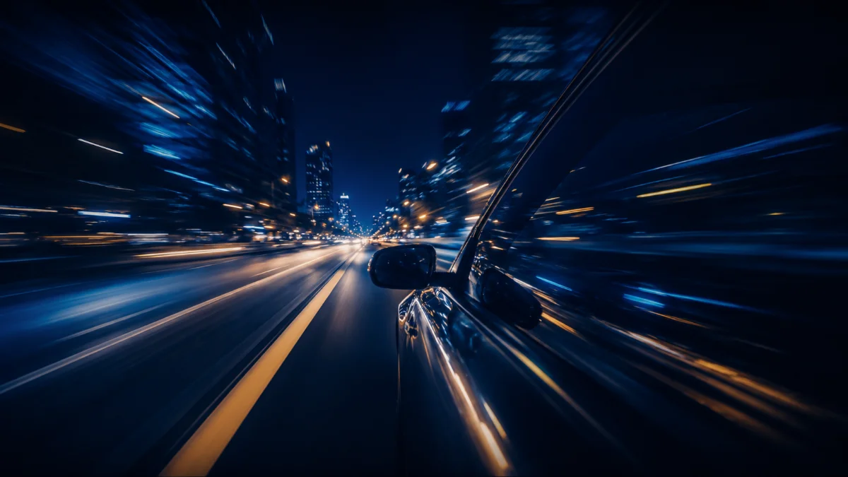Night drive · city lights streaking