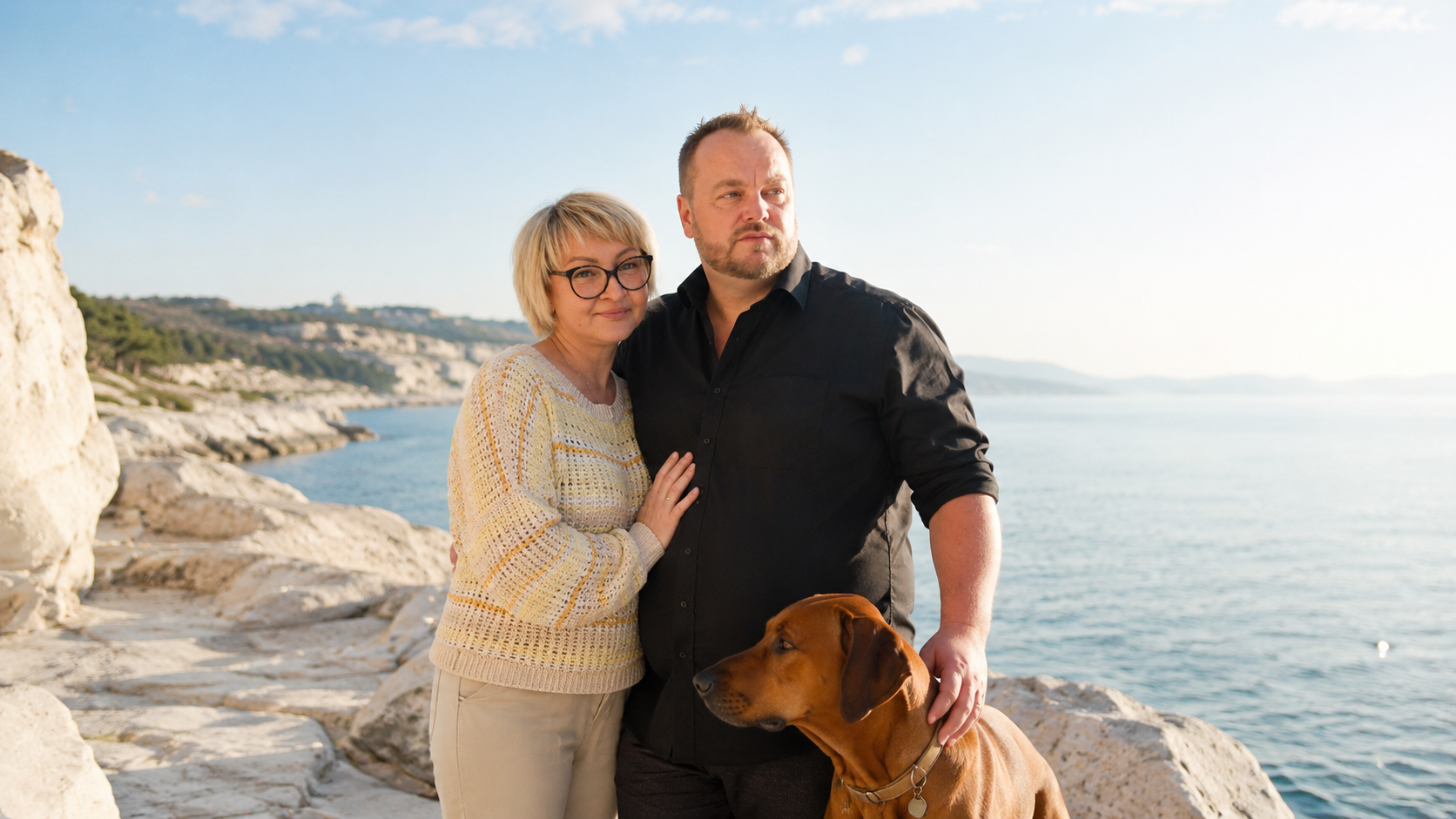 Roman, his wife, and Clay on the coast